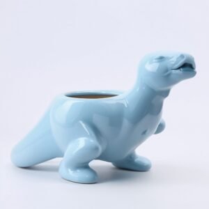 Doniczka w kształcie niebieskiego dinozaura