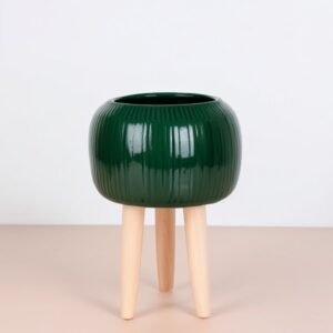 Ciemnozielona doniczka na nóżkach